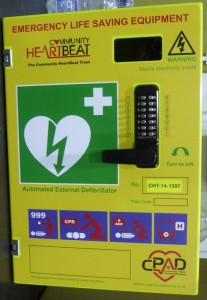 The box with the key code which holds the defibrillator. E. D.